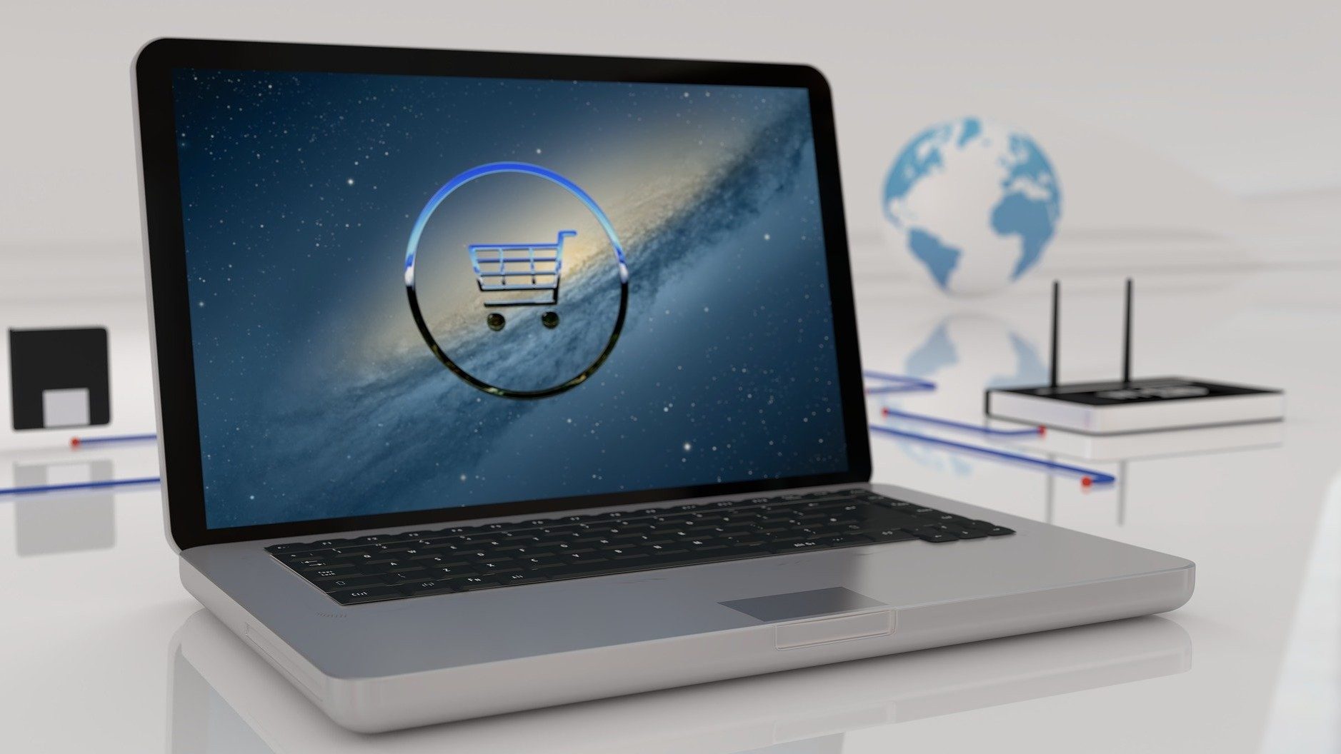 Auf einem Laptop-Bildschirm ist ein blauer Einkaufswagen zu sehen – es kann losgehen mit Onlineshopping